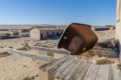 Ghost town kolmanskop site against clear sky