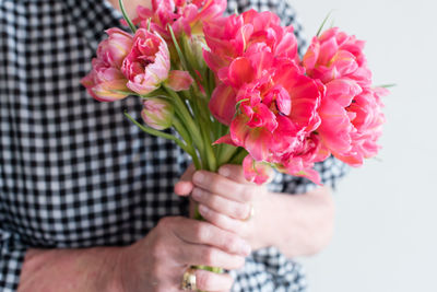 Close-up of hand holding bouquet