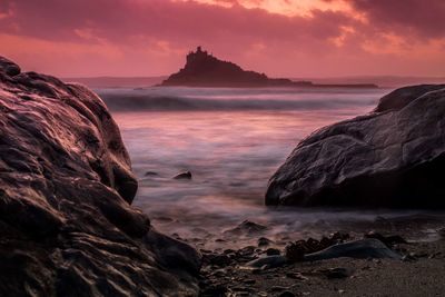 Scenic view of sea against sky during sunset