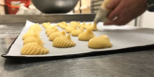 Midsection of person preparing food