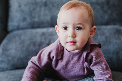 Cute baby girl at home