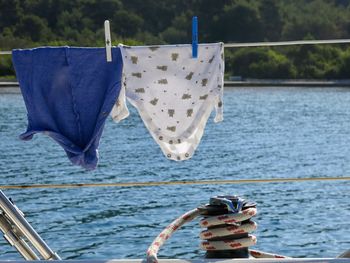 Clothes drying on clothesline at sea