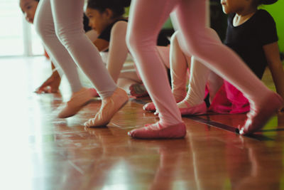 Low section of people standing on floor