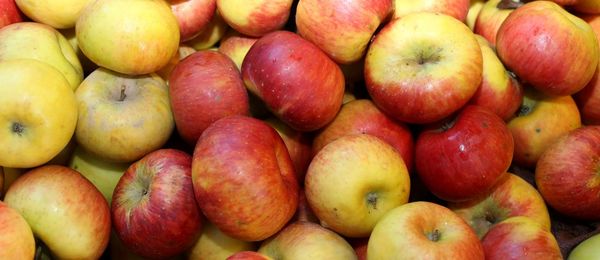 Full frame shot of apples for sale at market stall