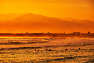 Scenic view of sunset over sea