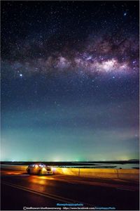 Scenic view of landscape against sky at night