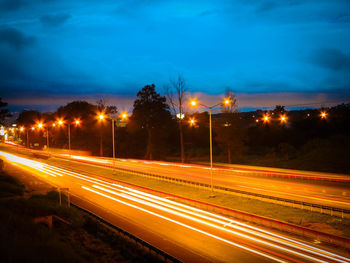 Light trails on road at night