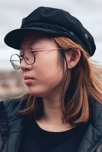 Portrait of woman wearing hat