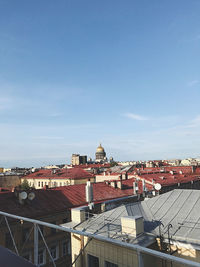 High angle view of buildings in city against sky