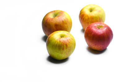 Close-up of apple against white background