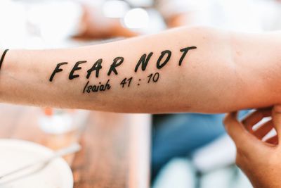 Close-up of tattoo on woman hand