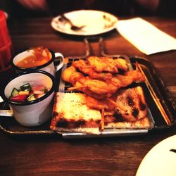 Close-up of food served in plate on table