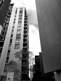 Low angle view of modern buildings against sky