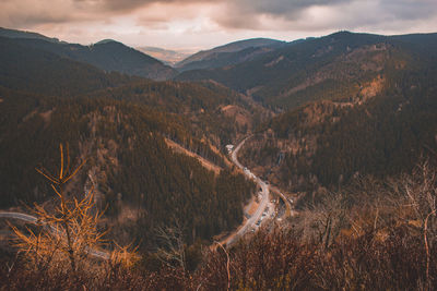 Scenic view of landscape and mountains against sky