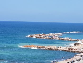 Scenic view of sea against clear sky