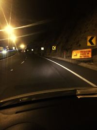 Cars on road at night