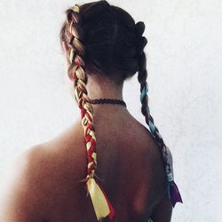 Rear view of woman with braided hair