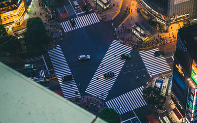 High angle view of illuminated buildings in city