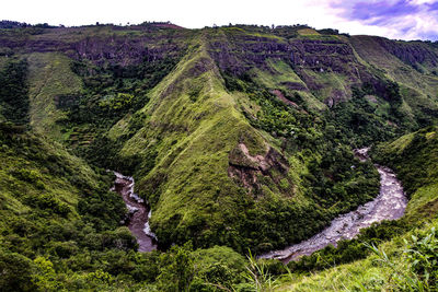 Scenic view of land against sky