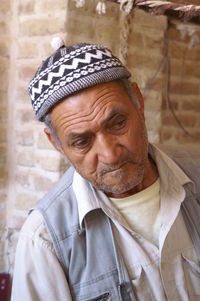 Portrait of man wearing hat outdoors