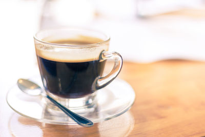 Close-up of coffee cup on table