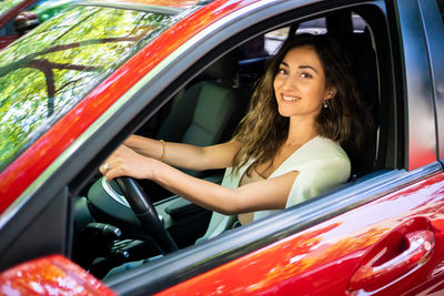 Portrait of woman in car