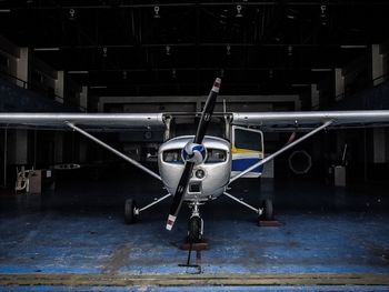 Airplane on airport runway at night