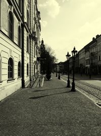 Street in city against sky