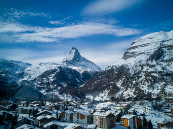 Snow covered mountain against sky