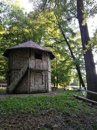 Built structure against trees in forest