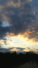 Scenic view of cloudy sky at sunset