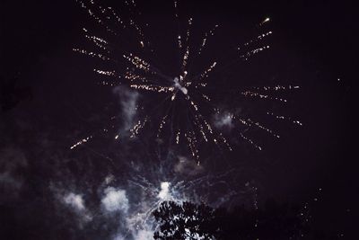 Low angle view of firework display