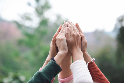 Cropped hand of woman holding hands