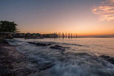 Scenic view of sea against sky during sunset