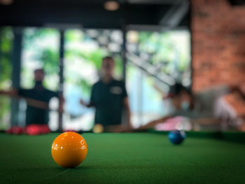 Close-up of pool balls on table