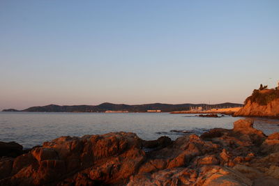 Scenic view of sea against clear sky