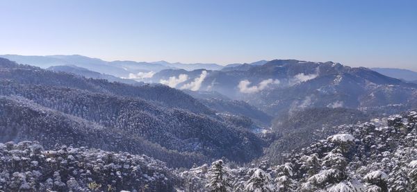 Scenic view of mountains against clear sky