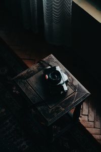 Close-up of camera on table