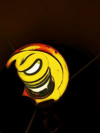 Low angle view of illuminated yellow lights