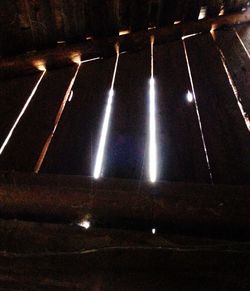 Close-up of illuminated lamp at night