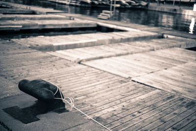 High angle view of wet pier on footpath