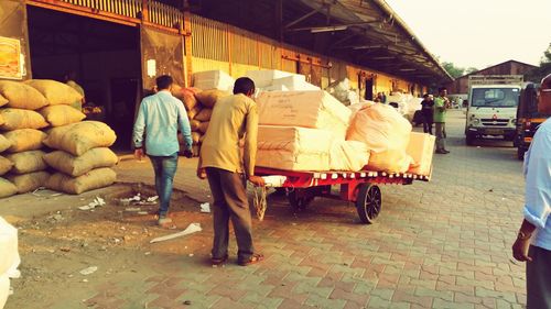People at market stall