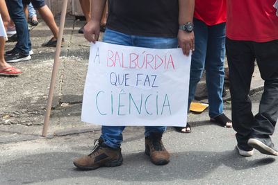 Students are seen with posters during a demonstration in favor of education