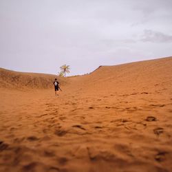 Scenic view of desert against sky