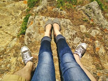 High angle view of woman standing on footpath