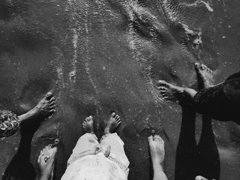 Low section of people on water