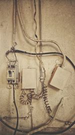 Close-up of electrical equipment on wall