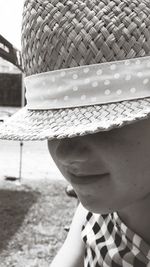 Close-up of girl wearing hat