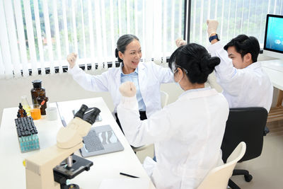 Business colleagues working in office