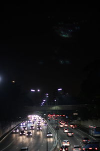 High angle view of traffic on road at night